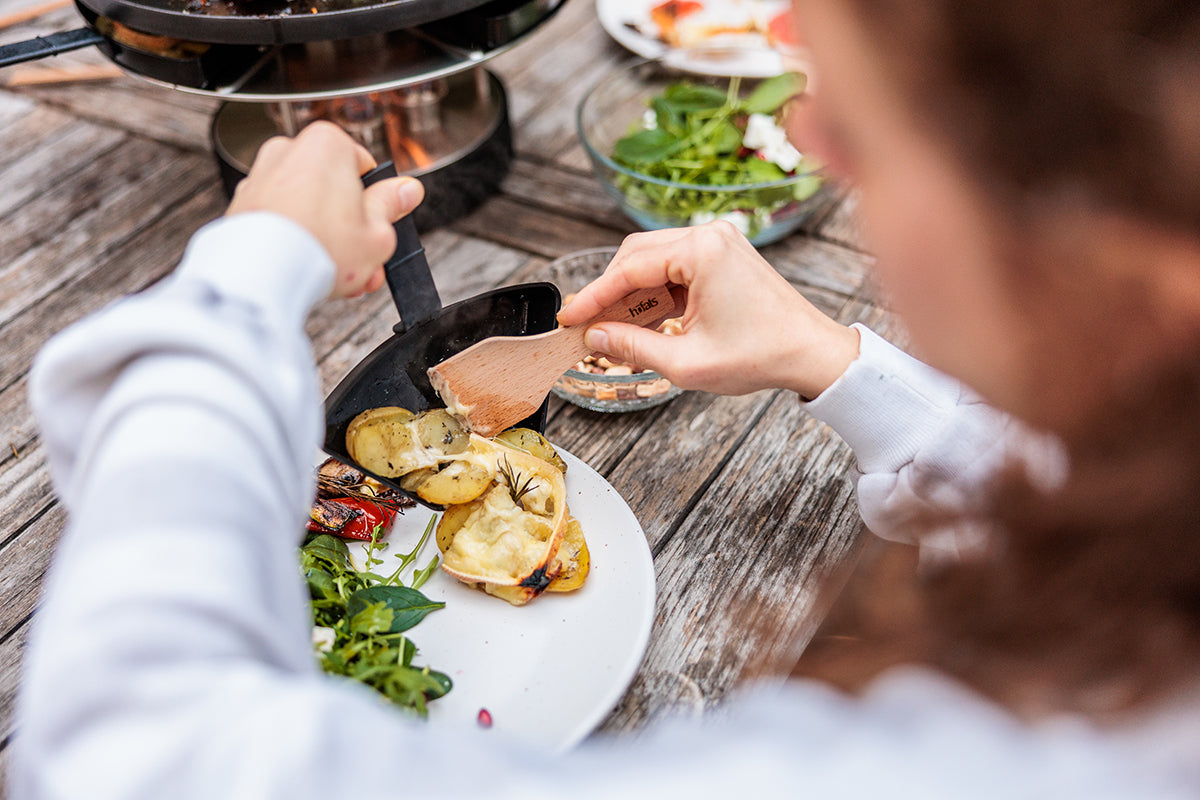 CIRCLE 35 Tabletop Grill Pro on a table with flames lit