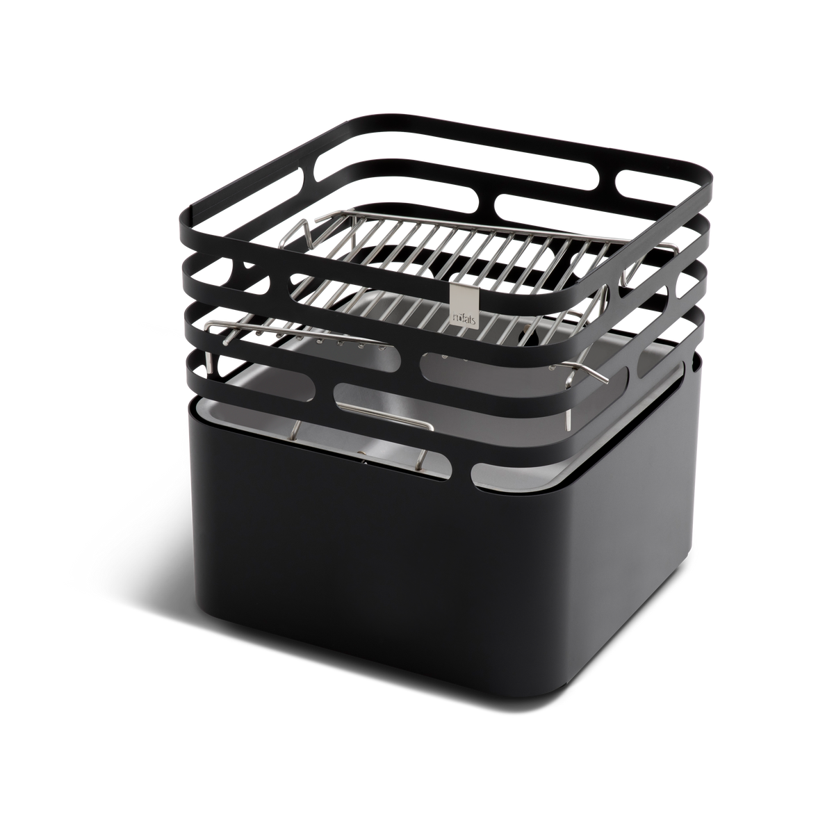 CUBE Cooking Grid set at the middle position in the CUBE Fire Basket